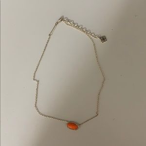 Orange Kendra Scott necklace